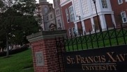 StFX University with sign