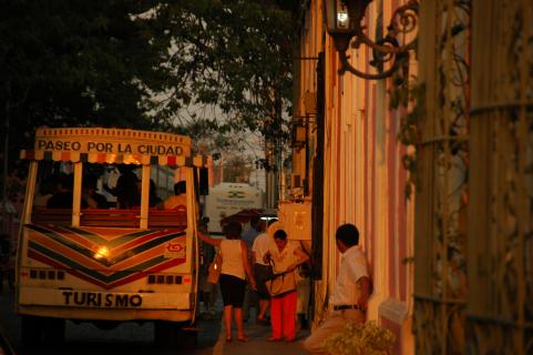 locals next to a bus