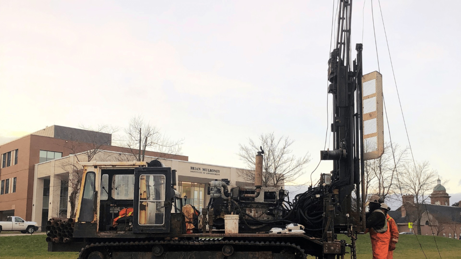 Geotechnical drilling rig on Victor Phillip Dahdaleh Hall construction site