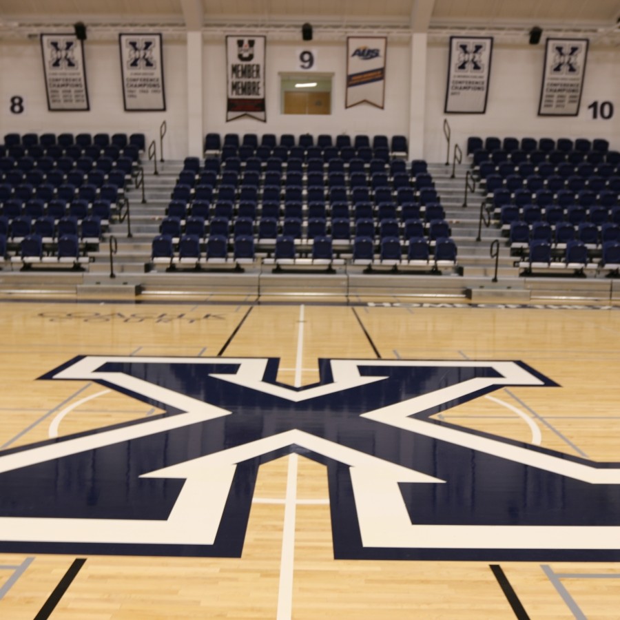 View of the indoor gym with the letter "X" on the floor
