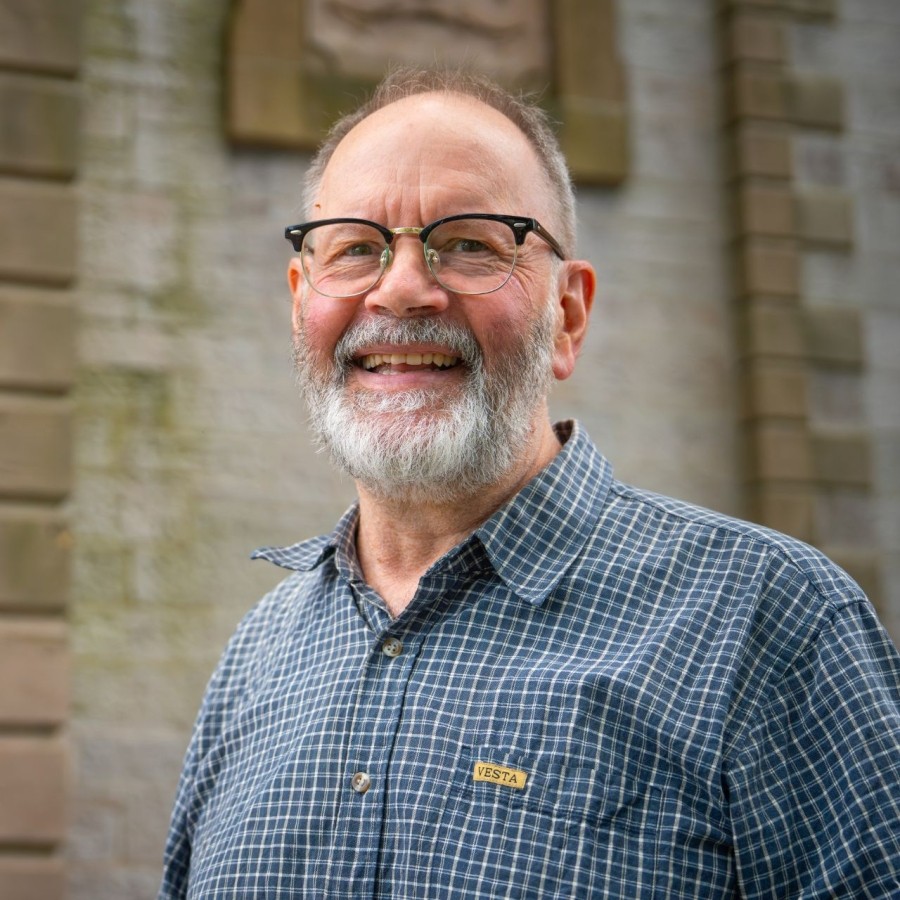 Dr. Matthew Anderson poses for picture in front of St. Ninans Catherdral