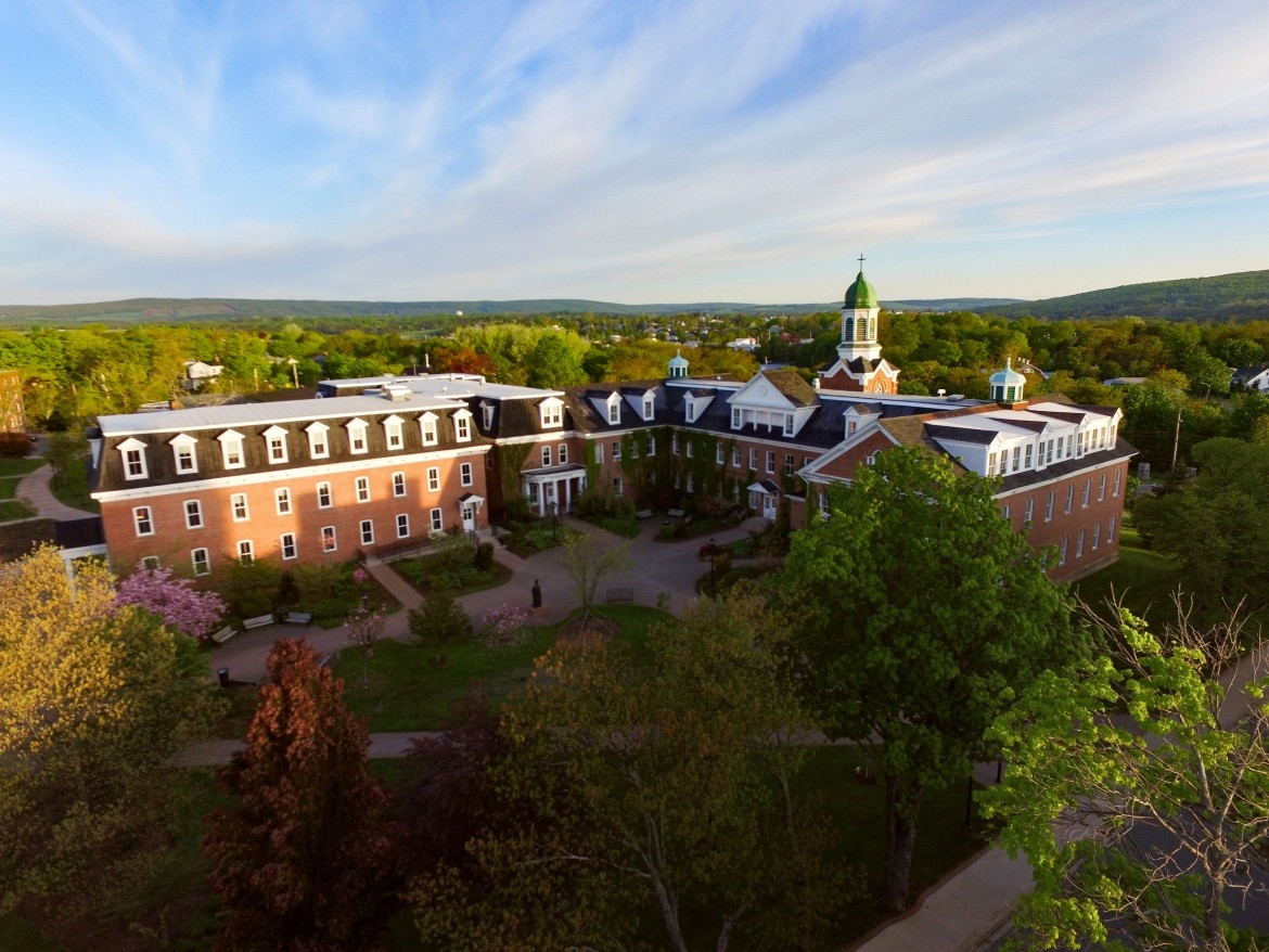 An aerial image of Xavier Hall at sundown.