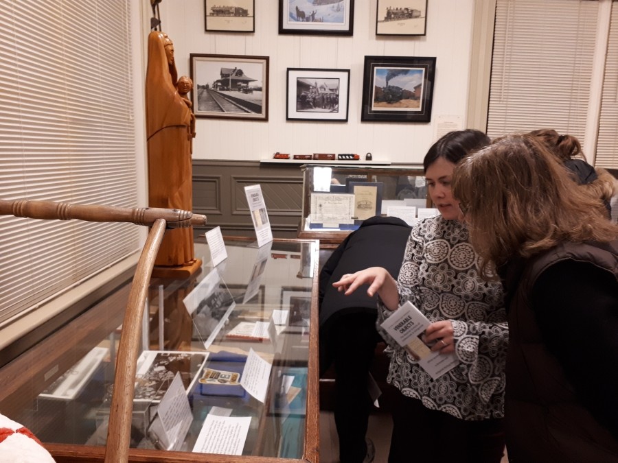 Student with Prof. Dr. Suzanne in front of Archeologic or Antique Artifacts