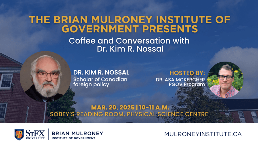 Blue sky with clouds, buildings below, and red leaves from a tree at the top of the frame.