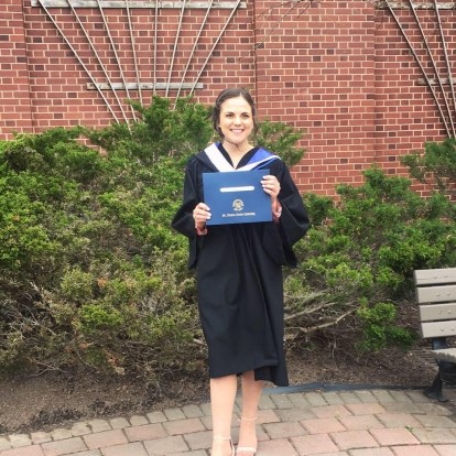 Elizabeth Holme's Photo. Showing her diploma