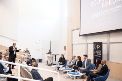 People in the Mulroney Hall auditorium