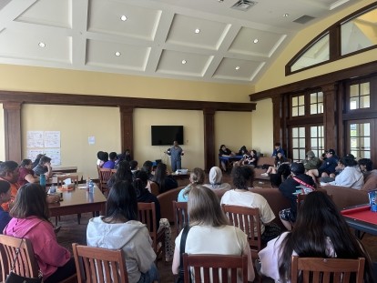 NASA scientist Dr. Renee Horton speaks with campers