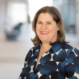 A medium-close image of Danielle Bennett smiling in Mulroney Hall.