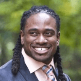 Headshot of a man outdoors